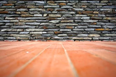 Real stone wall surface with cement Stock Photos