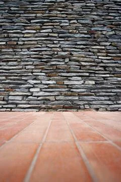 Real stone wall surface with cement Stock Photos