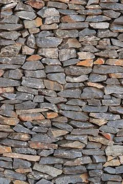 Real stone wall surface with cement pattern of modern style design real st... 写真素材