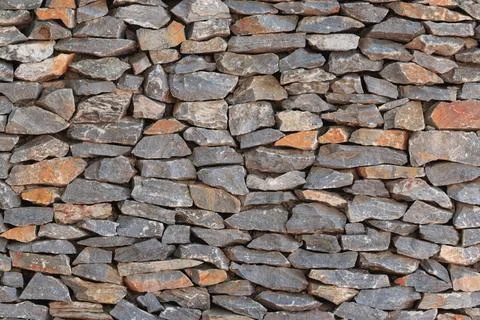 Real stone wall surface with cement pattern of modern style design real st... 写真素材
