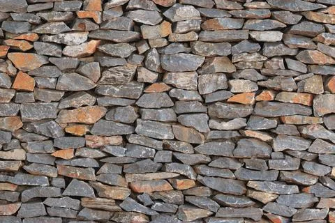 Real stone wall surface with cement pattern of modern style design real st... 写真素材