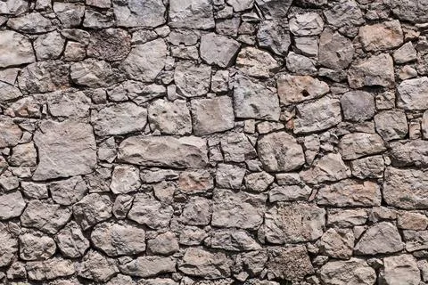 Real stone wall texture Stock Photos