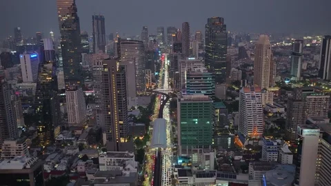 Real-time Aerial Night View Of Traffic Of Bangkok City With Towering Condos Stock Footage 329090921