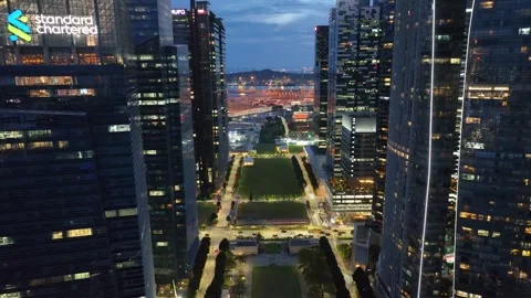 Real-time aerial video of sunset in Singapore skyline Stock Footage 303951141
