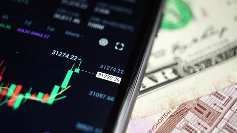 Real-time analysis of the cryptocurrency market in a smartphone Stock Footage 245548188