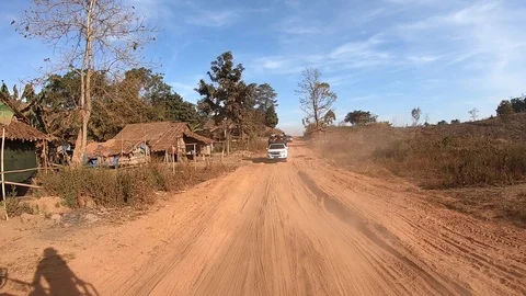 Real time car moving through the rough dirt up onto the mountain Stockbeeldmateriaal 123457022