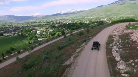 Real time drone shot of a buggy car Stock-Footage 136435888