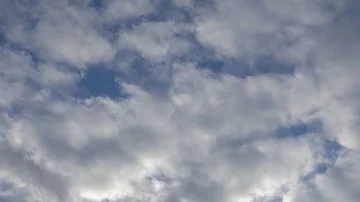 Real time flying grey clouds against blue sky. Stock Footage 85875561