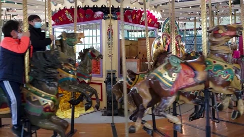 Real time footage of a Carousel ride at a park Stock Footage 165138145