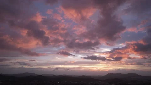 Real time footage of dramatic sunset sky in city Stock Footage 196450888