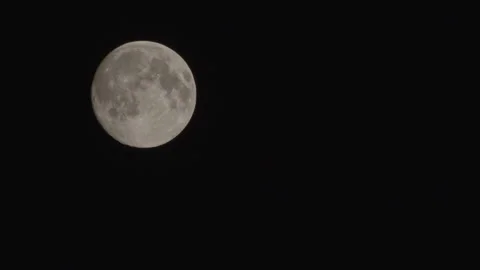 Real time Full moon close up, slowly moving, black sky. Visible craters Stock Footage 311018777