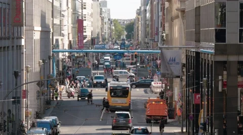 Real time locked down establishing shot of traffic on Friedrichstrasse in Berlin Stock Footage