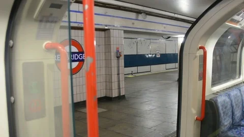 Real time, London Empty Central Line Tube car at station, with audio Stock Footage 127293432