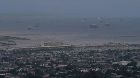 Real time long shot of cargo ships anchored off the Port of Los Angeles 스톡 동영상 163135592
