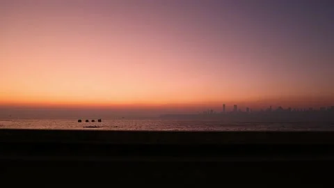 Real time medium still view of Mumbai City Skyline as seen from Marine Drive Stock Footage 171099902