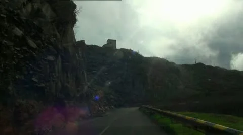 Real time mountain road with clouds 20110430 174419 Stock Footage