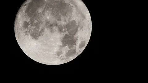Real-time native and very detailed UHD 60 fps extreme closeup shot of the moon Видео 98224222