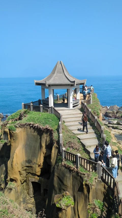 Real-time vertical shot of Taiwan Heping Island Park view point with visitors Stock Footage 313486007