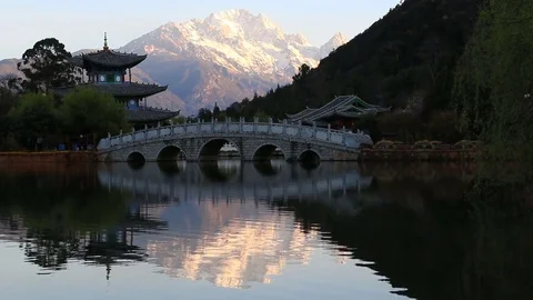 Real Time video of Black Dragon Pool and Jade Dragon Snow Mountain in Lijiang Stock Footage 73854994