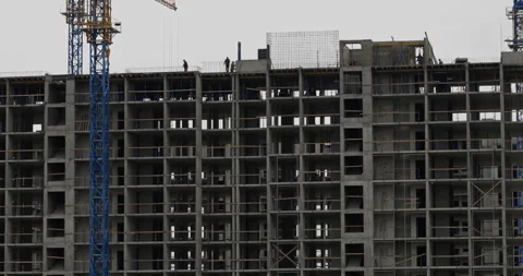Real Time Video of Construction Workers on Unfinished Residential Building Video stock 318657485