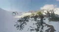 Real time view from cablecar cabin moving over snowy mountains, extreme sport 4k or 4k+ Resolution