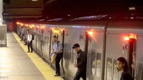 Real Time w/audio:  Passengers unload from a Metro North Train at Grand Central Stock Footage 250126888