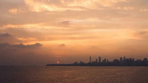 Real Time Wide Angle footage of Mumbai's Skyline during a Beautiful Sunset Stock Footage 117576505