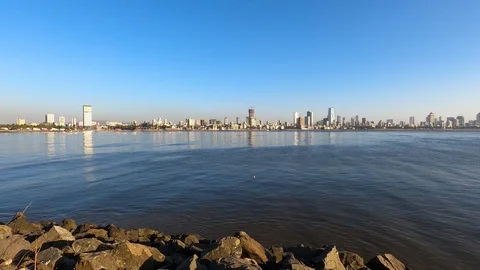 Real time Wide angle footage of beautiful city skyline by the sea, Mumbai, India Stock Footage 124141422