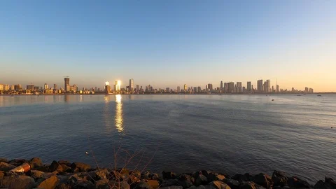 Real time Wide angle footage of city skyline during sunset, Mumbai, India Stock Footage 124142120