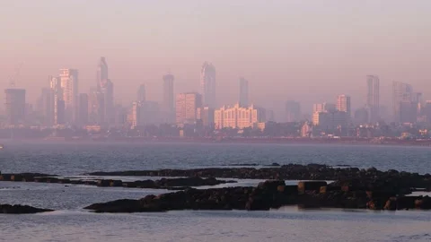 Real time Wide angle of Mumbai City Skyline as seen from Marine Drive Stock Footage 170990943