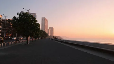 Real time wide angle view of Marine Drive promenade, Mumbai during sunset Stock Footage 170990066