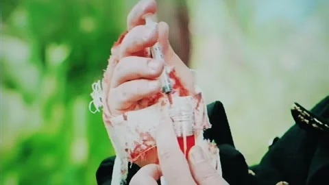 Real TV capture of a live action role play scene: a doctor picking a Stock Footage 278438731
