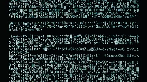 Real TV capture: obscure cryptic characters scrolling down on a computer Stock Footage 268807521