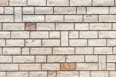 Real wall made of light grey brick background textured Stock Photos