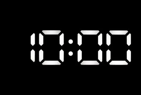 Real white led digital clock on black background Stock Photos