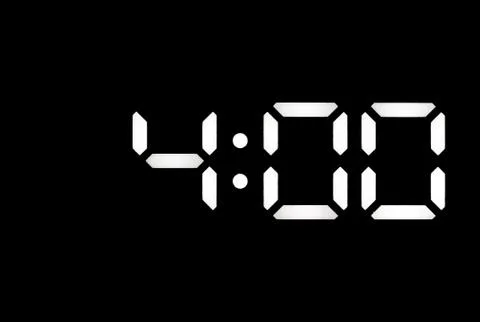 Real white led digital clock on black background Stock Photos