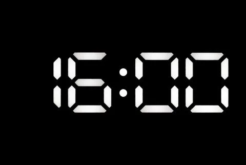 Real white led digital clock on black background Stock Photos