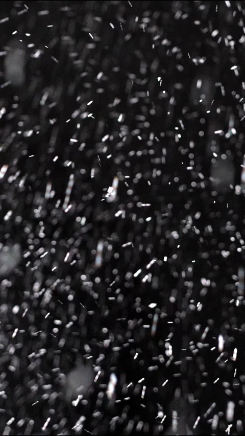 Real winter snow falling over isolated black background Video stock 293690160