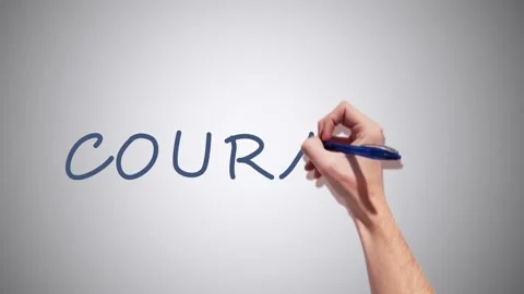 A Realistic 2D had writing Courage with a pen on a white background Stock Footage 155221395