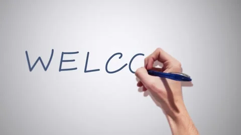 A Realistic 2D had writing Welcome with a pen on a white background Stock Footage 155301269