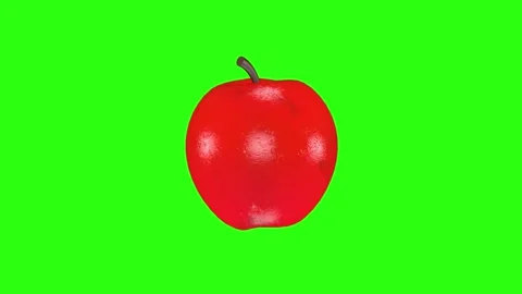 Realistic 3D animation of a red apple, rotating smoothly on a green background. Stock Footage 288027027