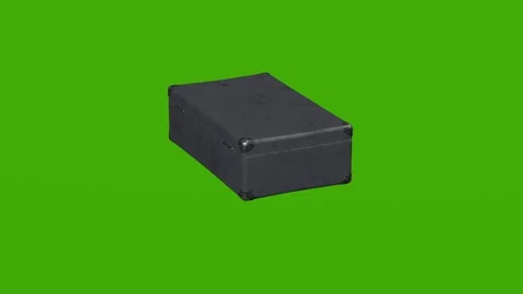 A realistic 3D model of a suitcase rotates on a green screenk Stock Footage 279063284