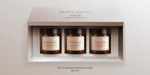 A realistic 3D vector mockup of scented vanilla candles in brown glass jars.. 库存插图