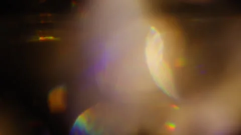 Realistic abstract orange flickering light leaks with a rainbow effect Stock Footage 345516885