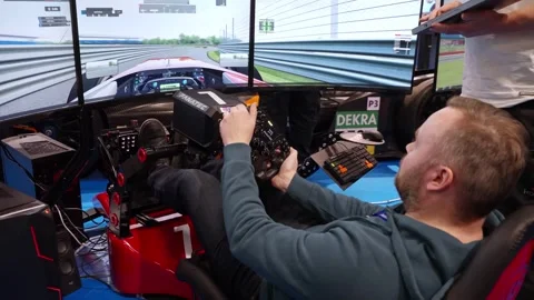 Realistic advanced dedicated sim racing hardware simulator setup Stock Footage 307490392