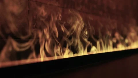 Realistic and captivating Fire Flames beautifully displayed on a Dark Background Stock Footage 315140224