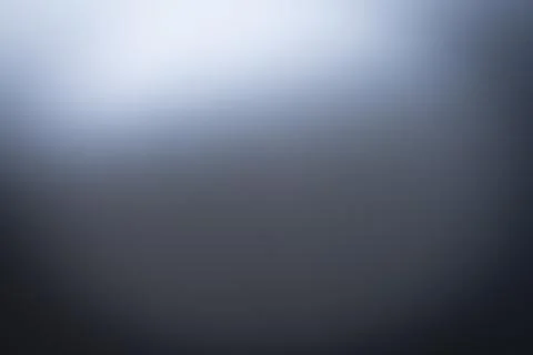 Realistic black background wallpaper texture with light flickering on a black Foto stock