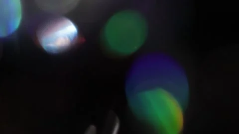 Realistic bokeh light effect with light leakage from close-up in the dark Stockbeeldmateriaal 317537274