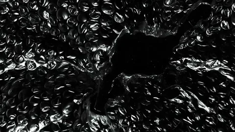 Realistic Bubble Wrap Plastic Texture with Central Torn Opening Wrinkled Texture Stock Footage 339028800