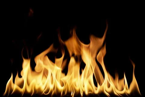 Realistic burning fire flames line isolated on black background Foto stock